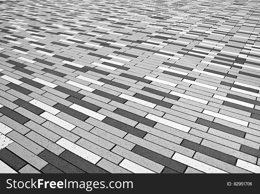 Abstract background from close up of bricks or paving stones in black and white. Abstract background from close up of bricks or paving stones in black and white.