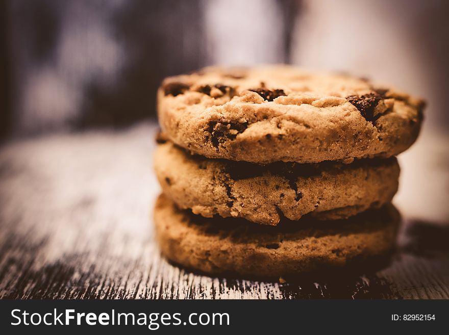 Macro Photography Of Pile Of 3 Cookie