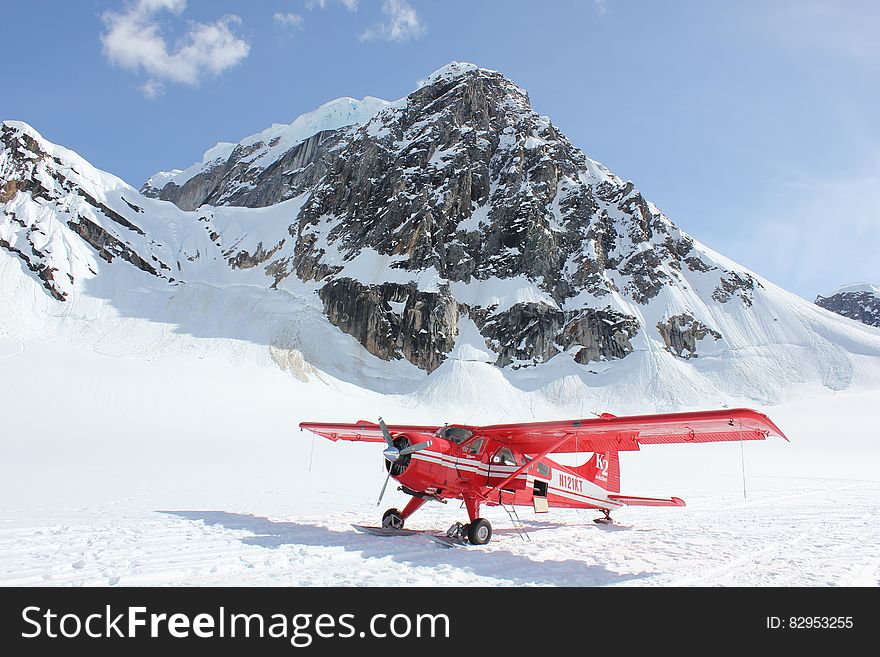 Biplane on snowy mountain