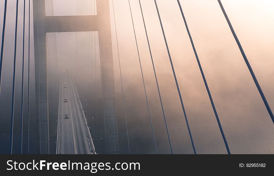 High Angle View of Suspension Bridge Against Sky