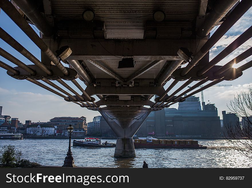 Underside of Millennium Bridge over River Thames, London, England