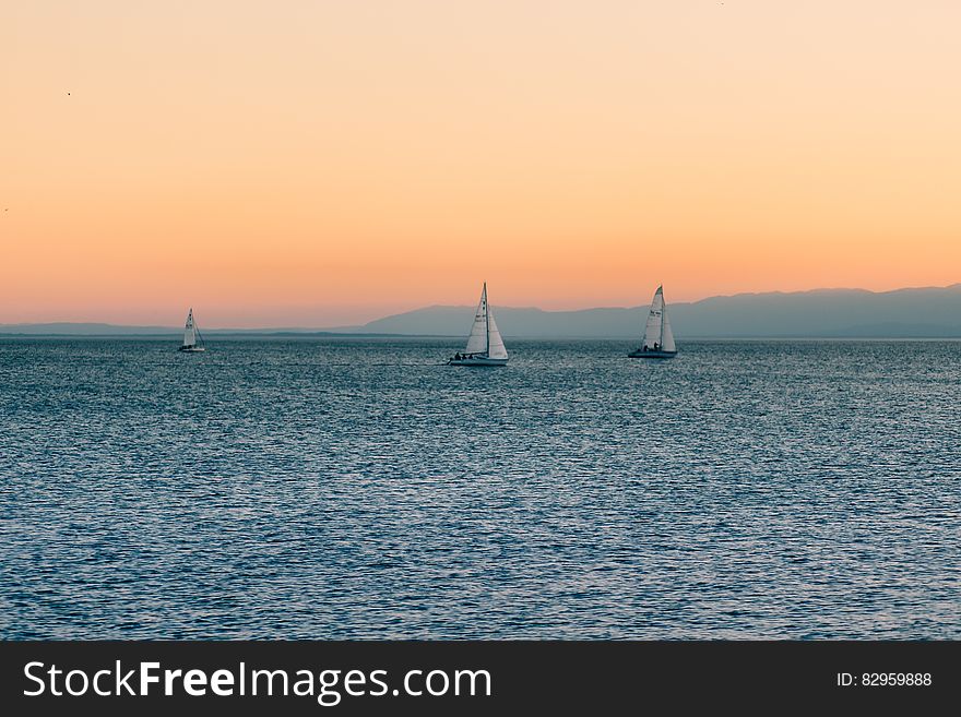 3 Sailboats On Water During Daytime