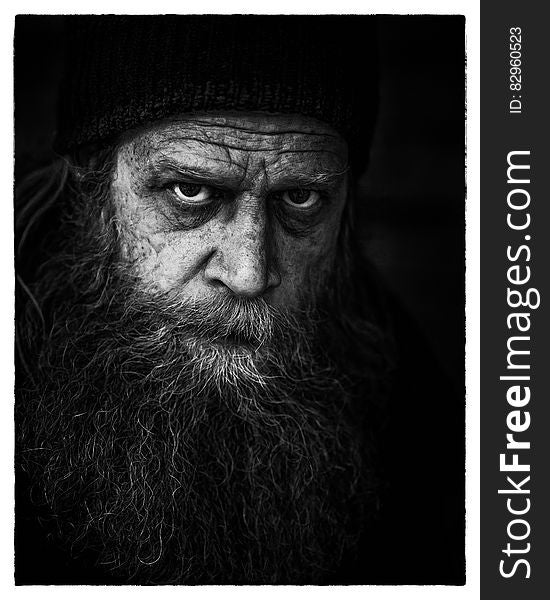 Man&#x27;s Face in Grayscale Photography