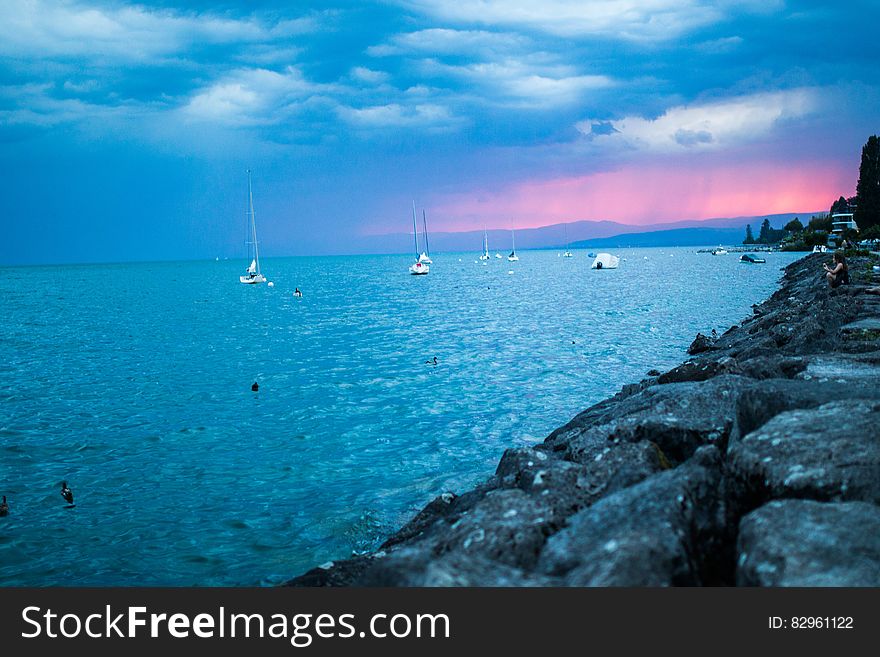 Boats on the sea at sunset