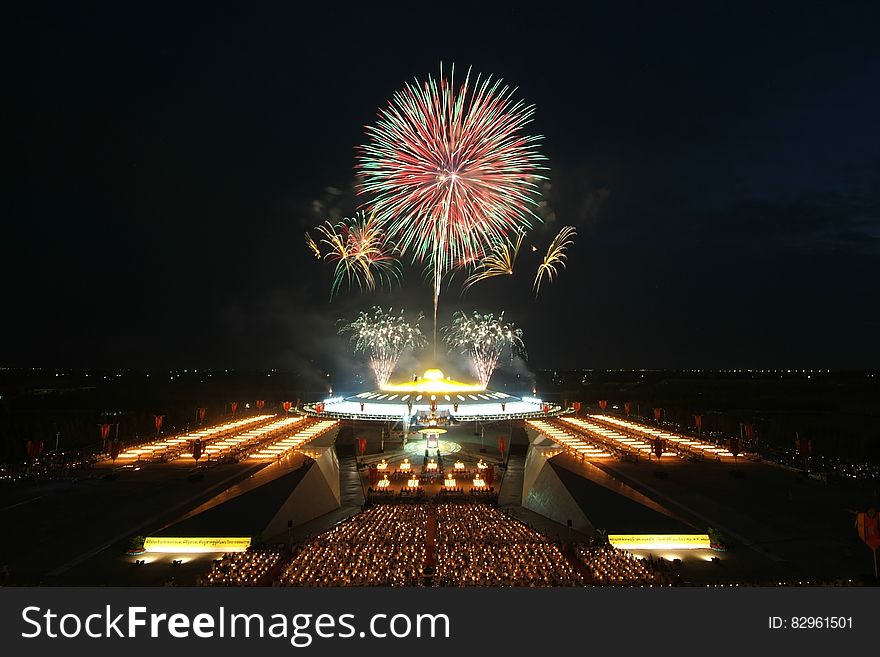 Colorful fireworks exploding at night during New Years Eve display. Colorful fireworks exploding at night during New Years Eve display.