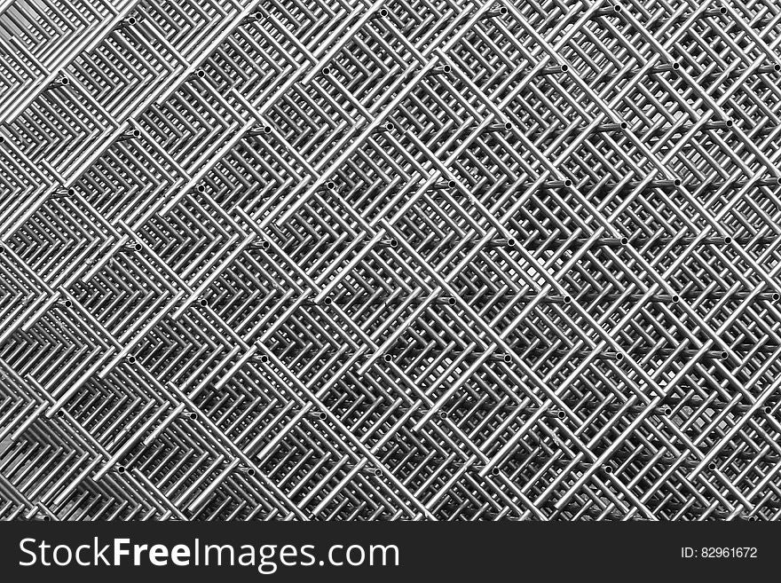 Abstraction of close up on steel mesh in black and white. Abstraction of close up on steel mesh in black and white.
