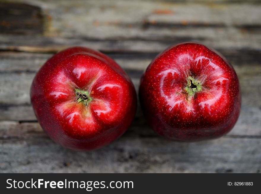 Two Red Ripe Apple on Gray Table