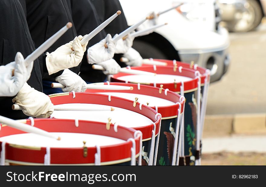 Group Of People Playing Drums During Daytime