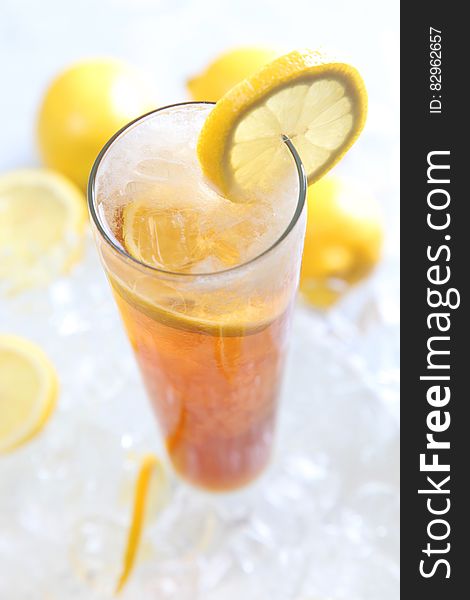 Cold Drinks Served on Clear Highball Glass With Lemon Garnish