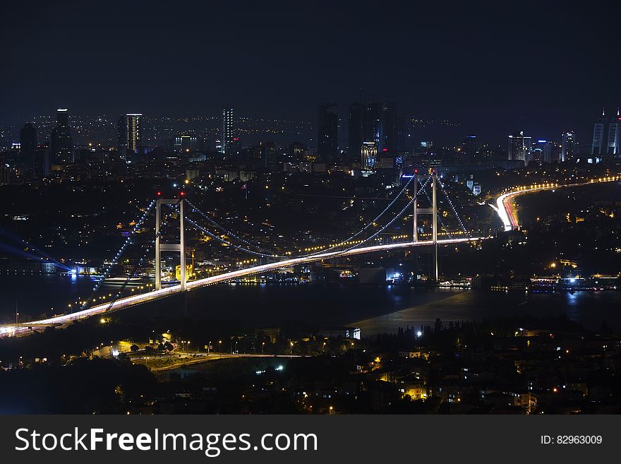 Aerial view of bridge through Istanbul, Turkey illuminated at night. Aerial view of bridge through Istanbul, Turkey illuminated at night.