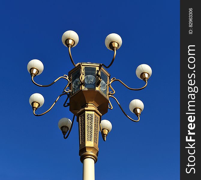 Brown Metal Street Lamp Under Clear Blue Sky During Daytime