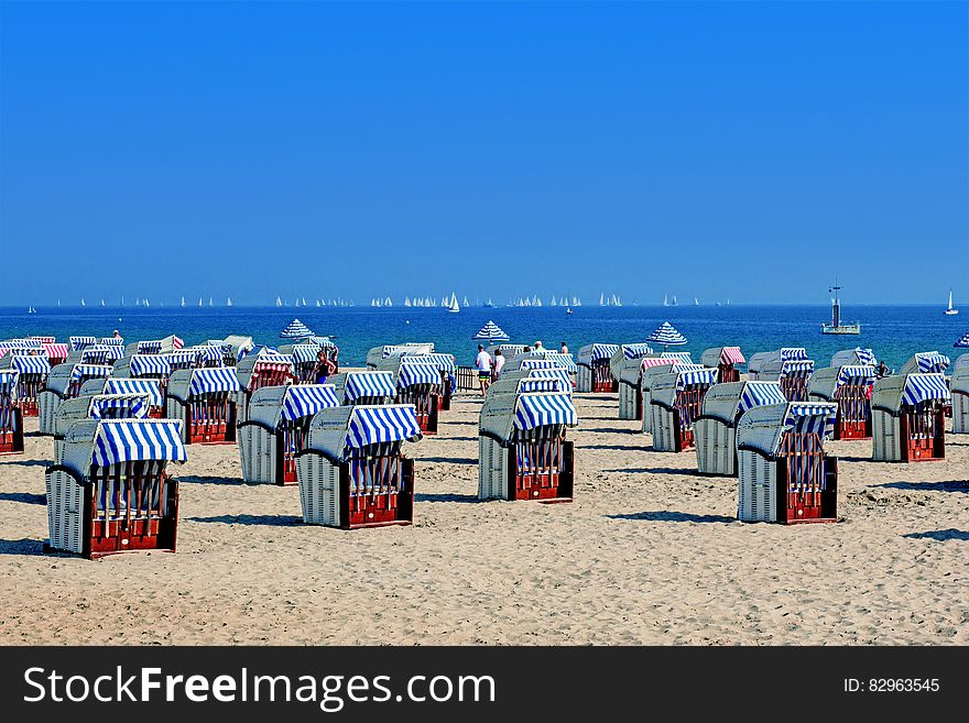 Folded beach chairs on Baltic Sea