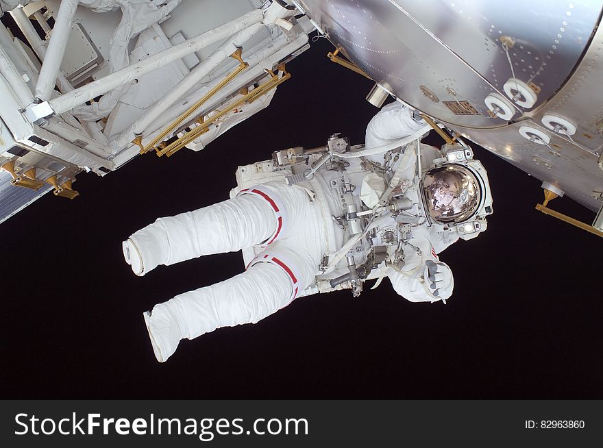 Person In White Astronaut Suit