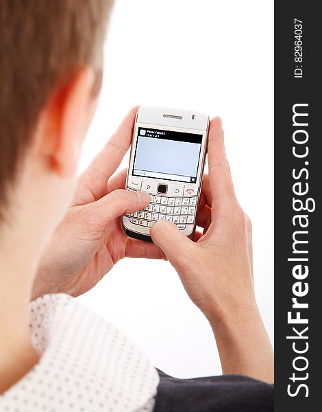 Man using Blackberry mobile device.