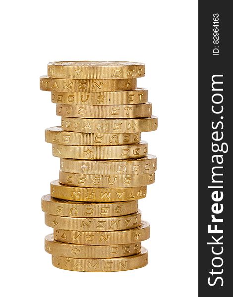 A pile of coins isolated on white background.