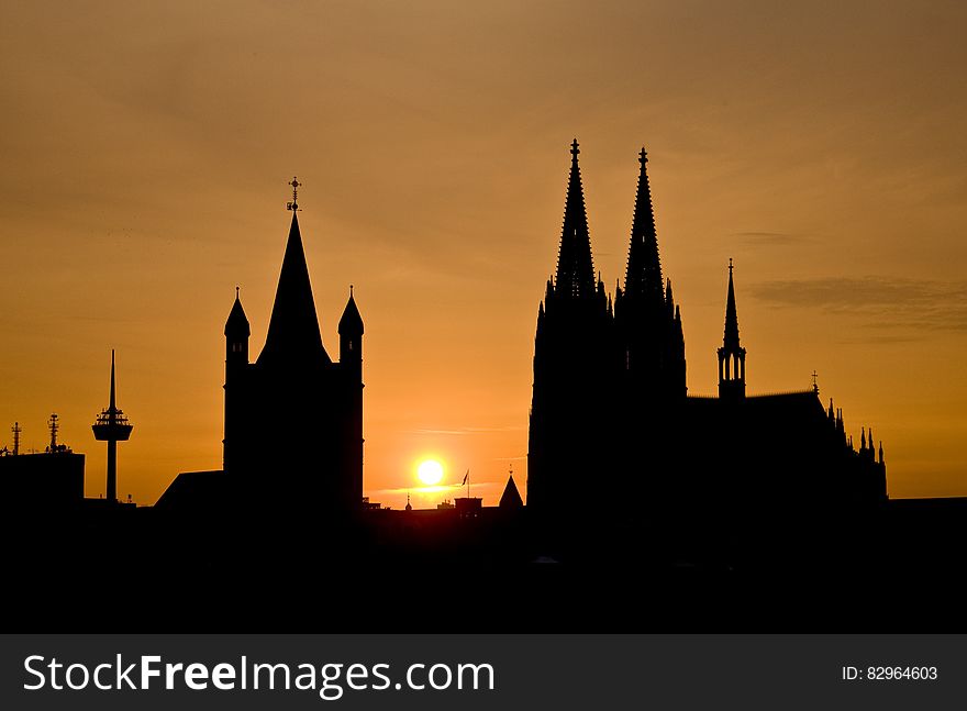 Silhouette Of Building During Sunset