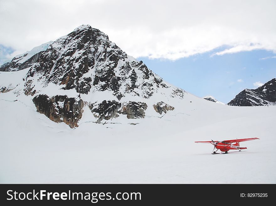 Biplane in alpine field