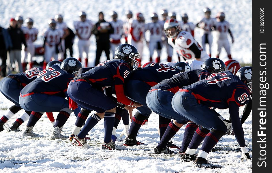 Football Team on Ice during Daytime