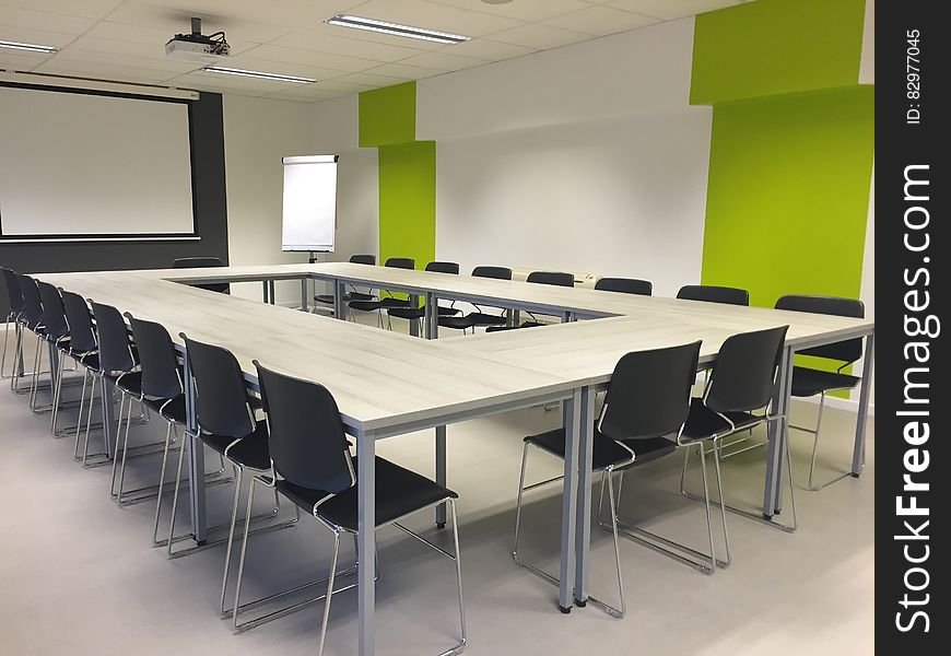 Black Chairs And White Table