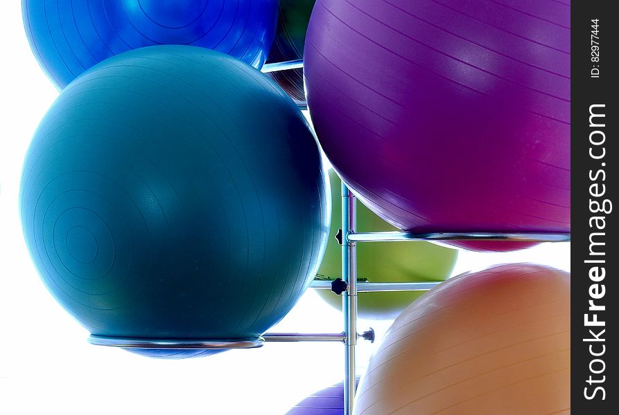 Blue Exercising Ball On Stainless Steel Exercising Ball Rack