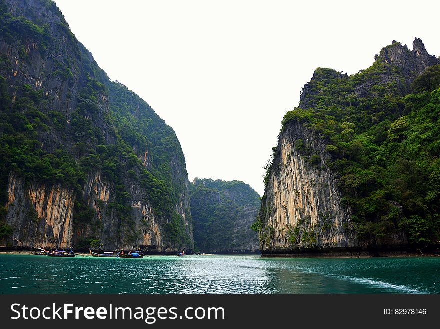 Cliff faces along coastline of blue waters. Cliff faces along coastline of blue waters.