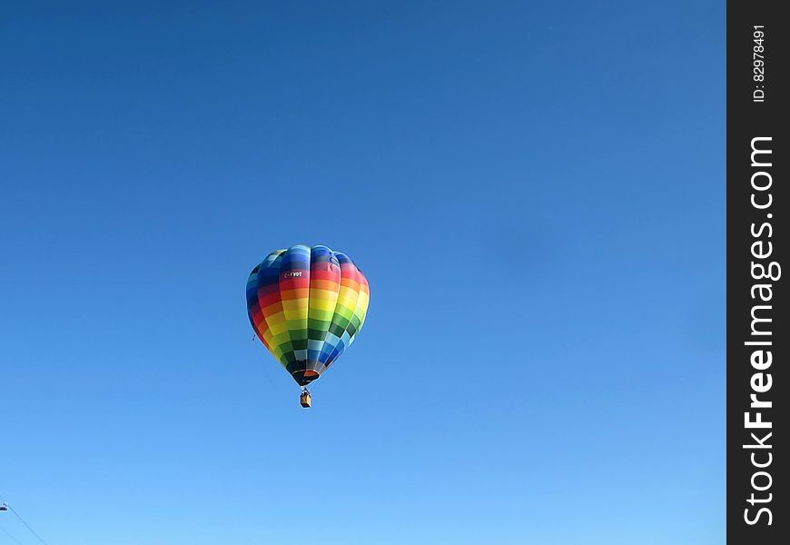Colorful hot air balloon in blue skies. Colorful hot air balloon in blue skies.