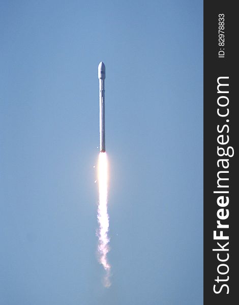 A Falcon rocket from SpaceX blasting off. A Falcon rocket from SpaceX blasting off.