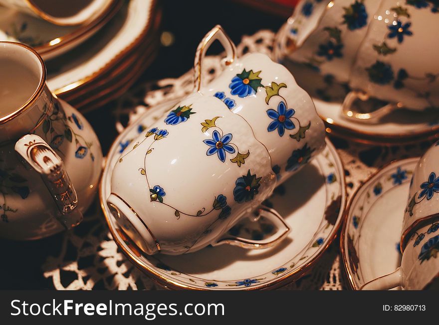 Closeup elevated view or porcelain china tea set with floral pattern. Closeup elevated view or porcelain china tea set with floral pattern.