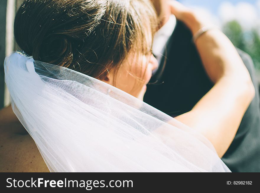 Bride Dancing With Groom In Black Suit Jacket