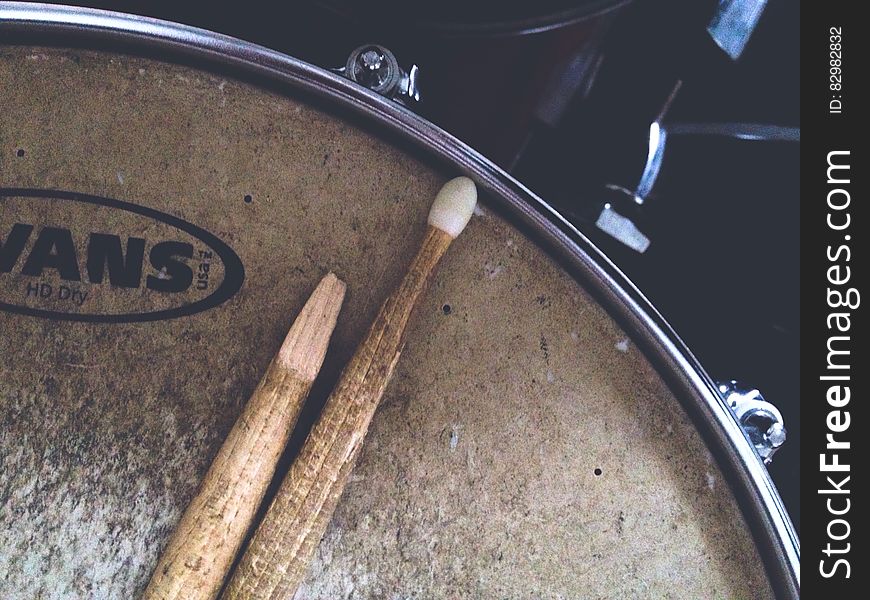 Broken drumstick on drum