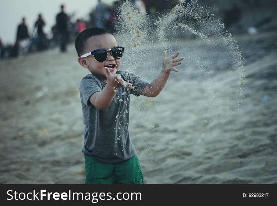 Kid playing at beach