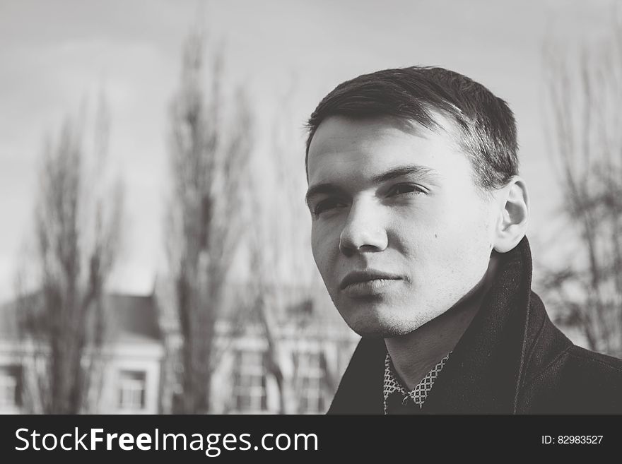 Close-up Of Young Man Against Sky