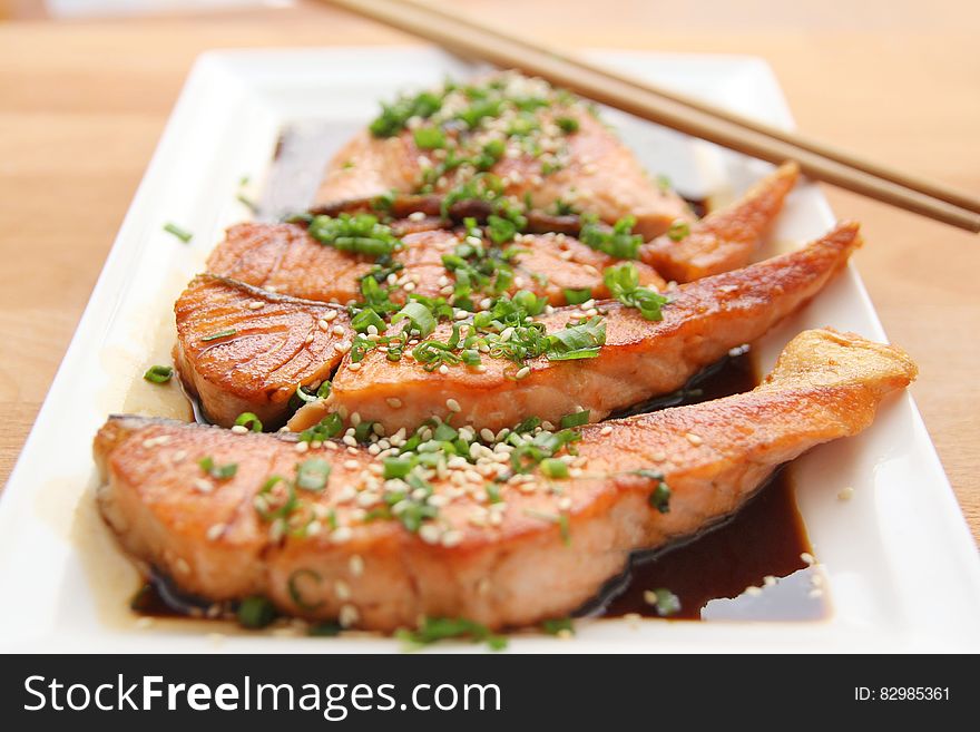 Cook Fish On White Ceramic Plate