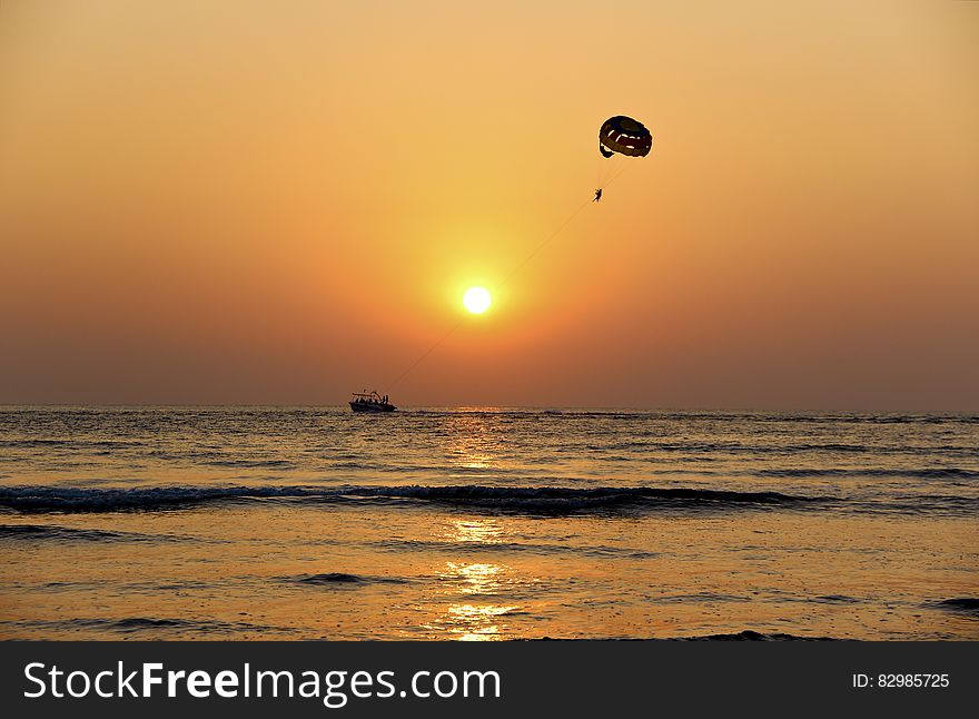 Parasailing at sunset