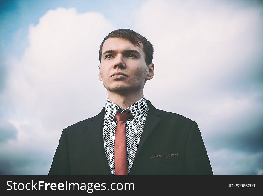 Portrait of Young Man Against Sky