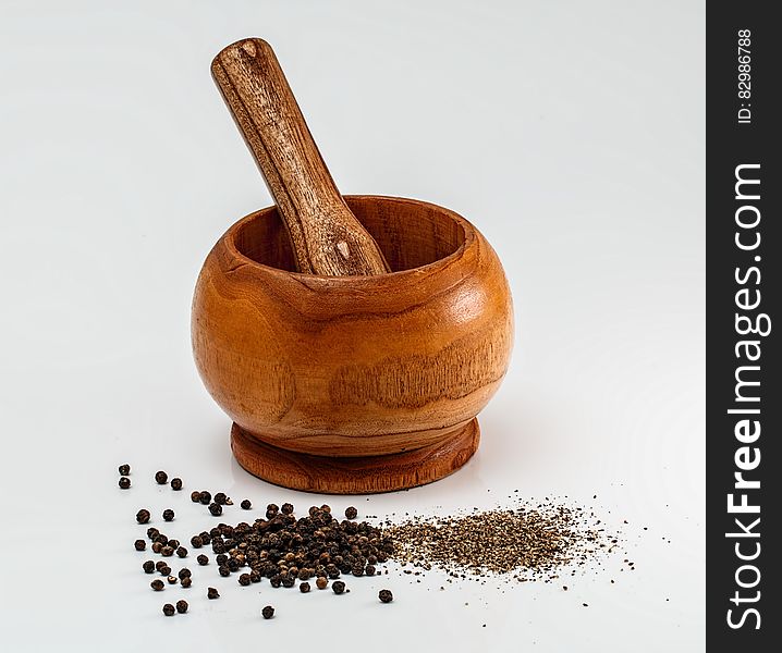 Brown Wooden Mortar Teasle