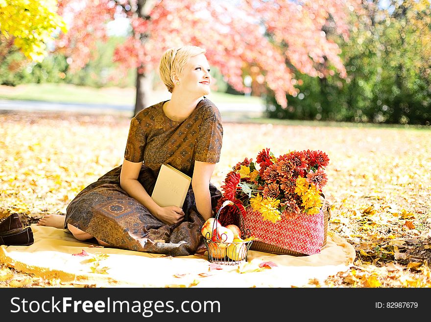 Woman in autumn park