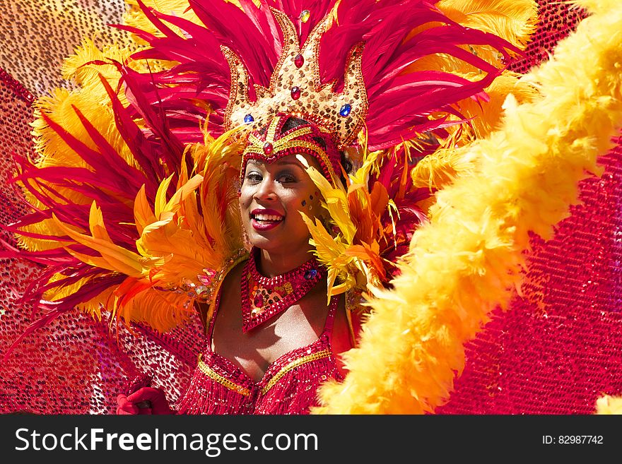 Woman Wearing Yellow Pink Costume