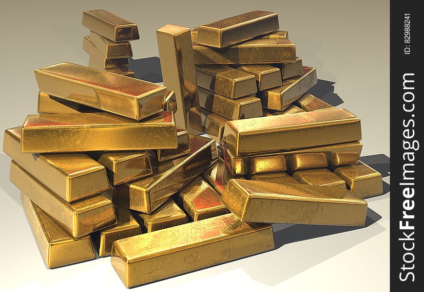 A stack of gold bars or bullion.