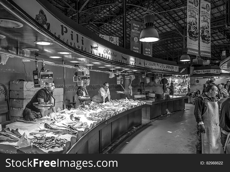 Gray Scale Photo of a People in Market