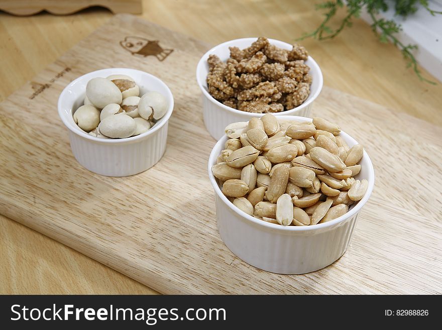 Brown Nuts on White Ceramic Bowl