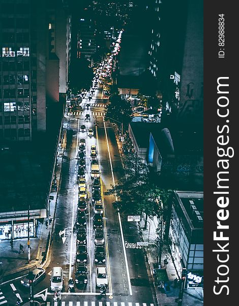 Cars on Black Asphalt Road during Nighttime