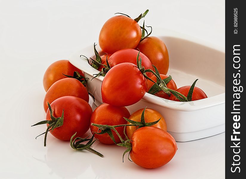 Red Tomatoes on White Bowl