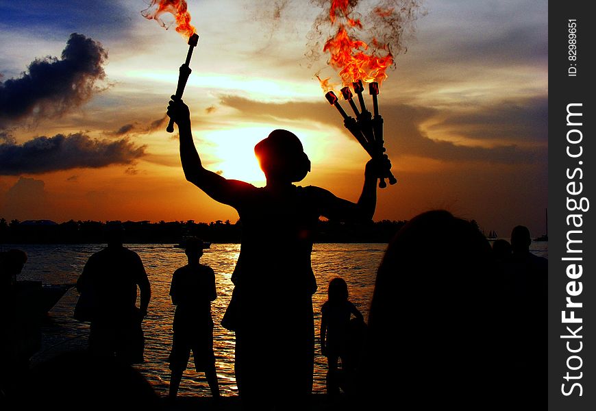 People Near Beach during Night Time