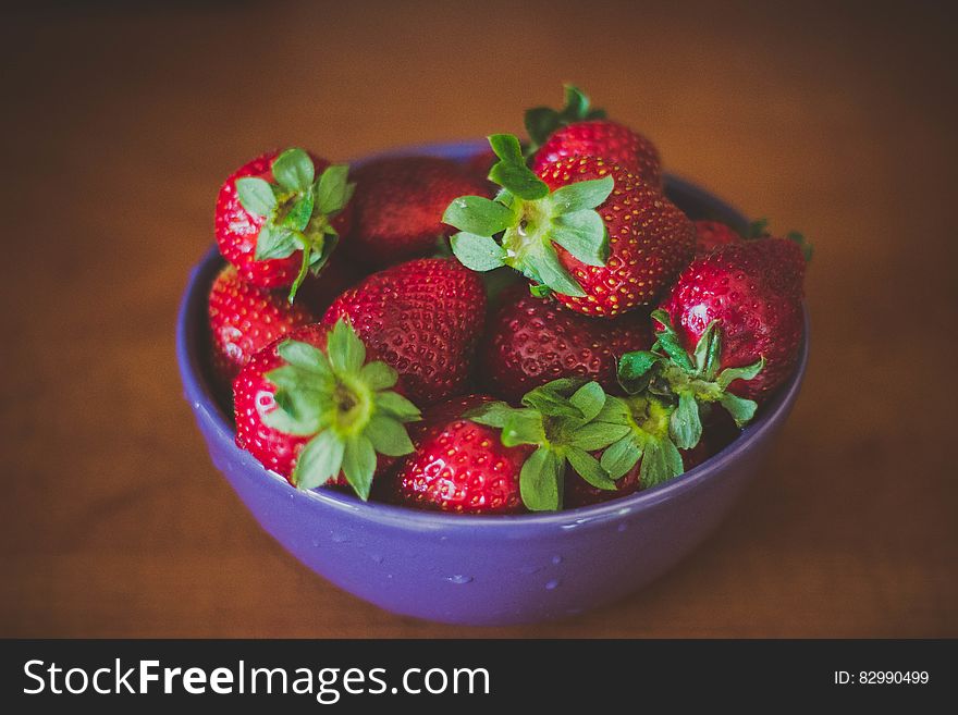 Blue Round Bowl Of Fresh Strawberries