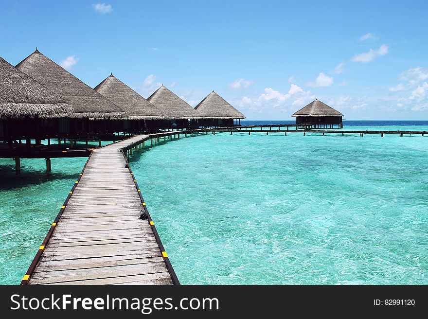 Wooden boardwalk and bungalows, Tahiti