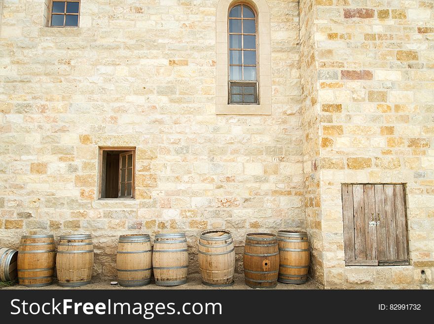 Seven whisky barrels standing beside the castle walls collected as vessels in which to store wine while it matures. Seven whisky barrels standing beside the castle walls collected as vessels in which to store wine while it matures.