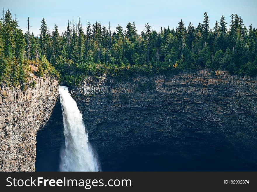 Green Trees Above Mountain and Falls during Daytime