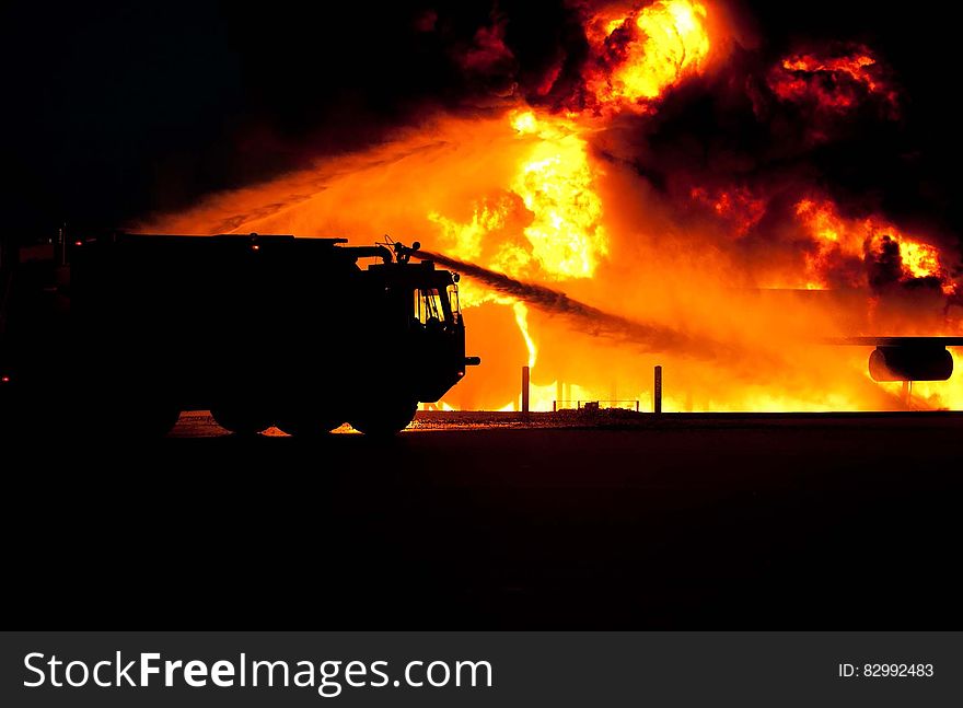 Firetruck Spraying Water On Fire