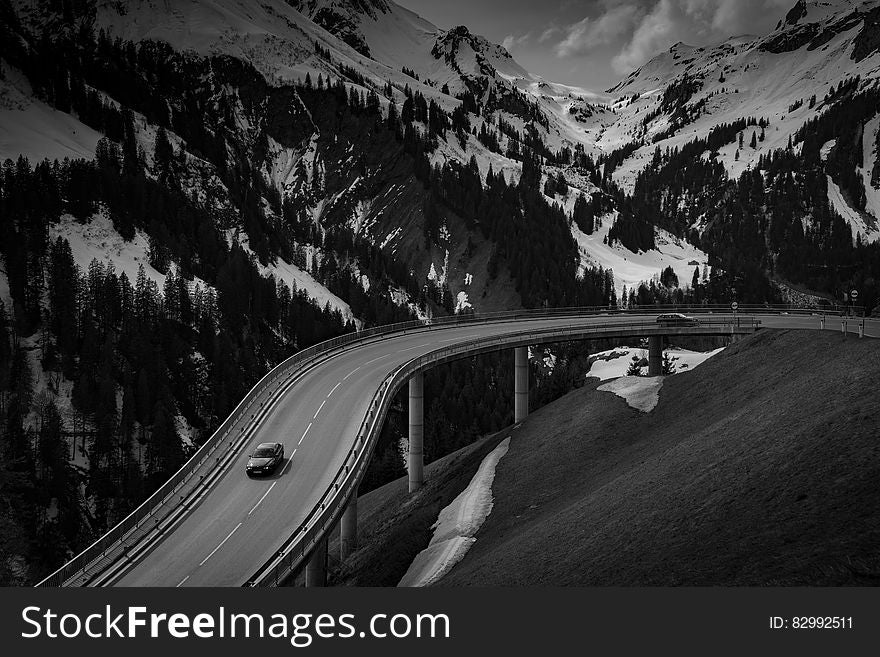 Grey Car on Road Near Snow Covered Mountain